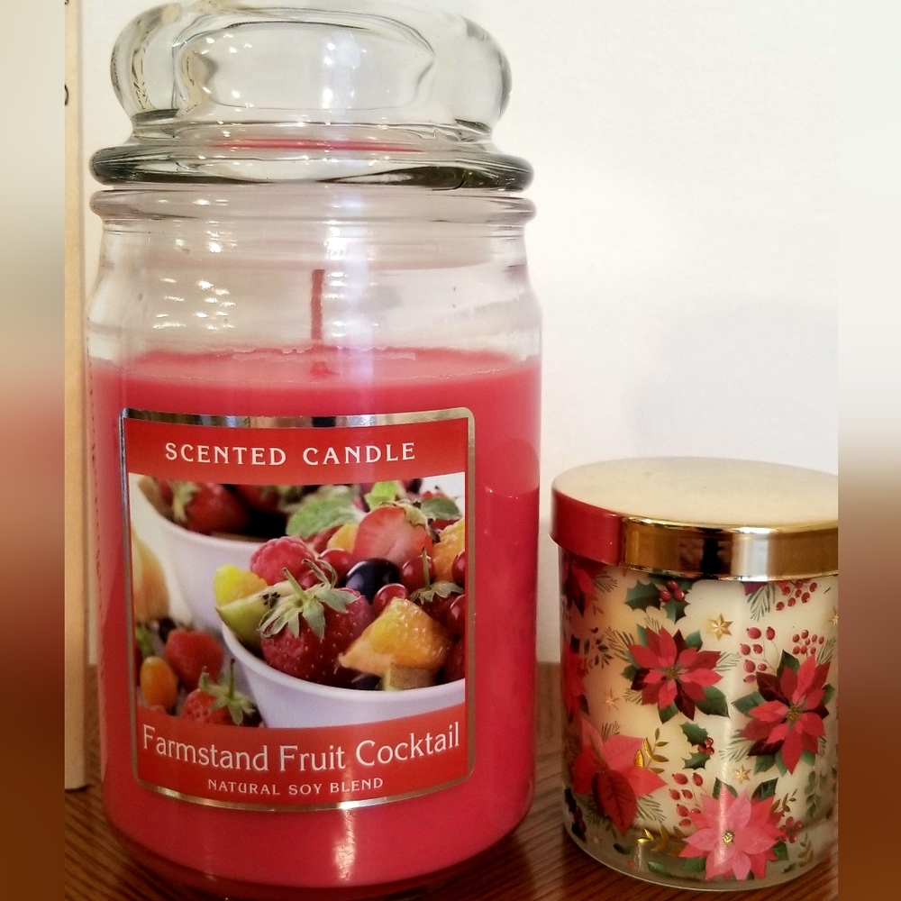 2 candles. The larger is fruit cocktail. The smaller is holiday scented.